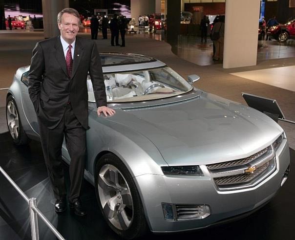 General Motors Chairman and CEO Rick Wagoner with the Chevrolet Volt electric concept in the GM exhibit at the 2008 North American International Auto Show.